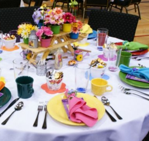 Table set with colorful plates and napkins